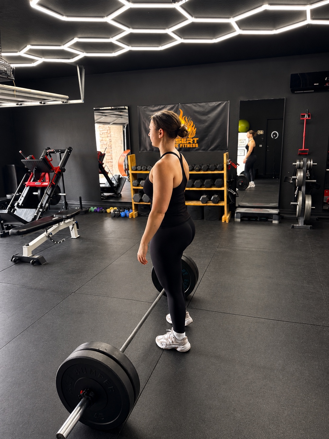 Melody training with a barbell inside the Desert Blaze Fitness studio